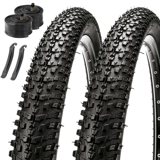Two black knobby mountain bike tires shown upright with a black inner tube and two black valve stems on a plain white background.