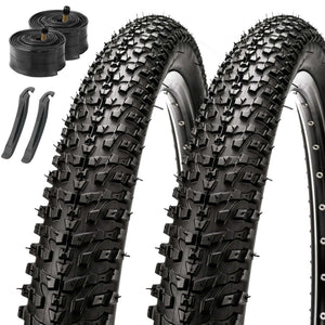 Two black knobby mountain bike tires shown upright with a black inner tube and two black valve stems on a plain white background.